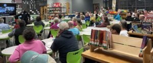 Panorama view of White Station Elementary School library filled to capacity on March 21, 2024, with more than 50 people for the inaugural meeting of the Avon Woods Neighborhood Watch