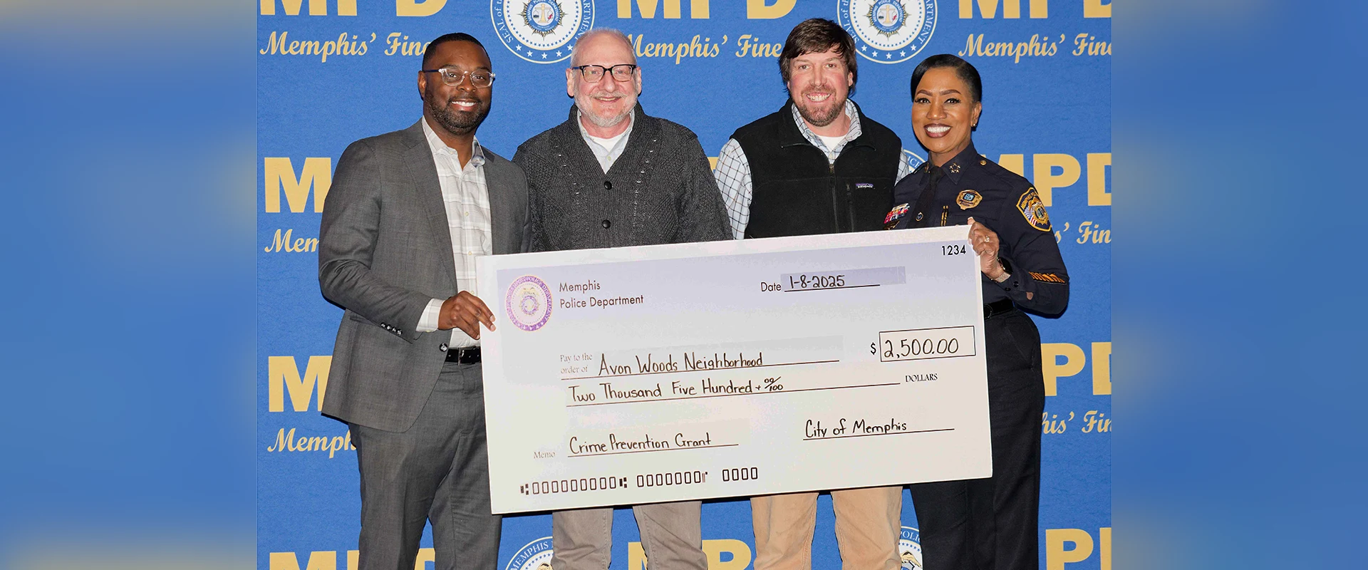 Avon Woods representatives receiving MPD Neighborhood Watch grant check from Memphis Mayor Paul Young and Memphis Police Chief CJ Davis, Jan. 8, 2025