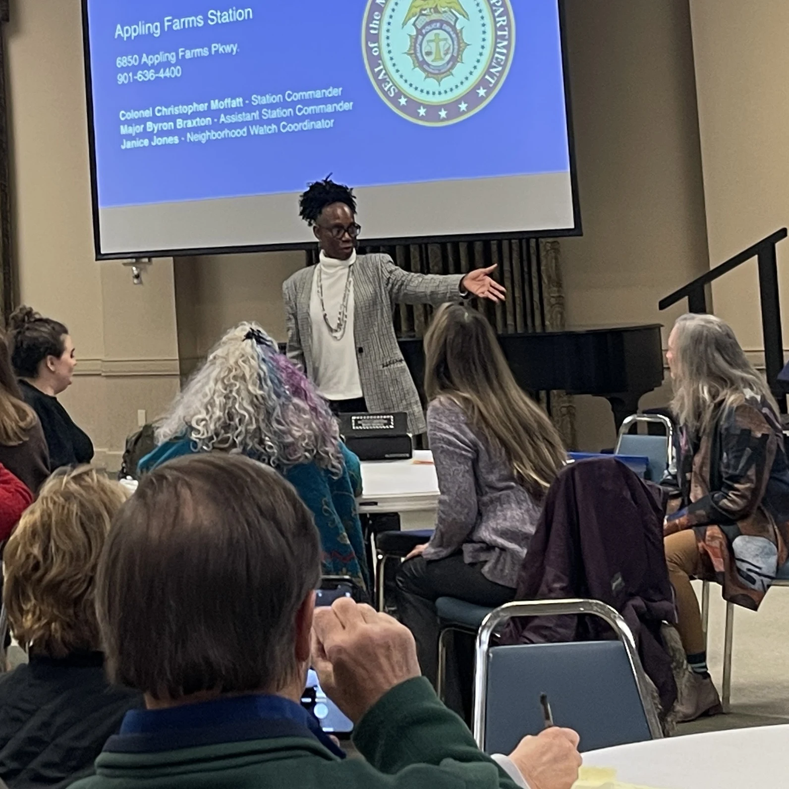 Janice Jones, MPD Neighborhood Watch Coordinator for the Appling Farms Station precinct, addresses the group.