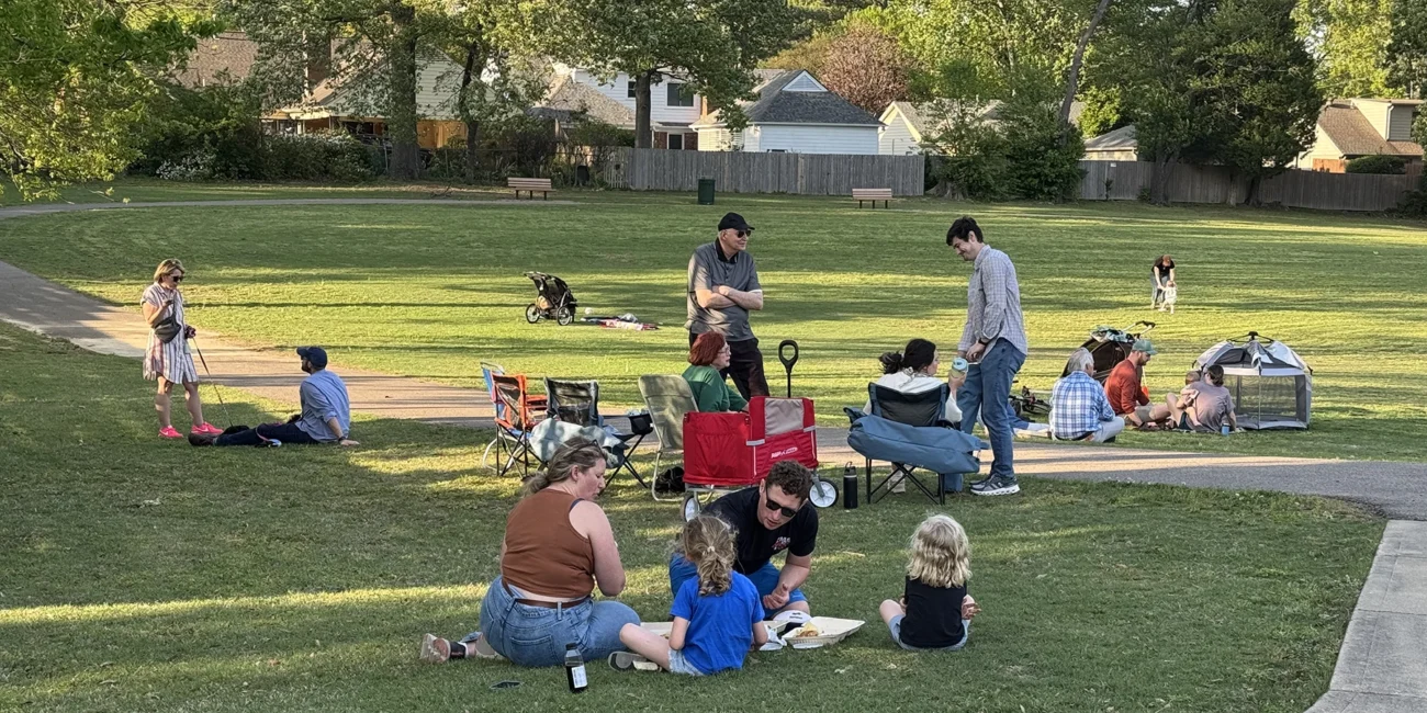 Families enjoying a food truck social in Avon Park in the summer of 2025