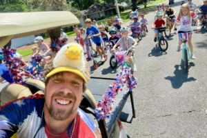 Ryan "Torrent" Johnston leads the parade like a Patriotic Bald Eagle Pied Piper