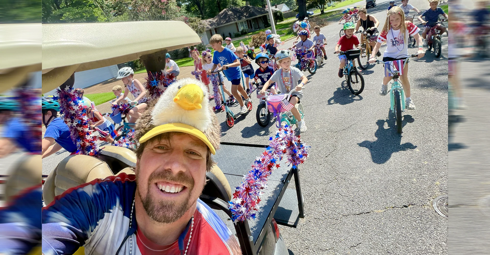 Ryan "Torrent" Johnston leads the parade like a Patriotic Bald Eagle Pied Piper